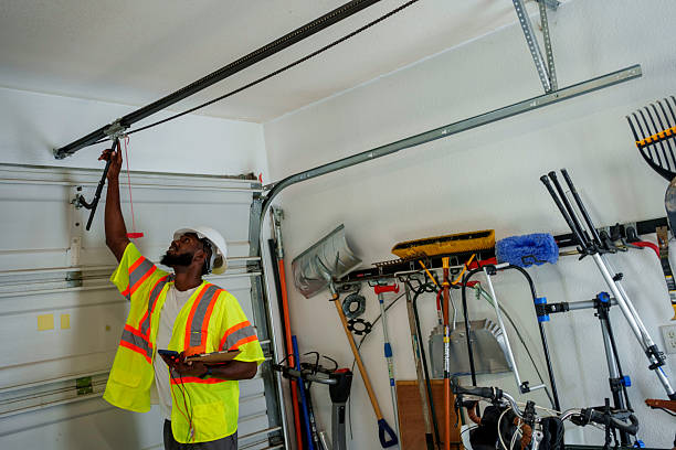 Professional Garage Door Panel Replacement technician working in Newcomerstown, OH